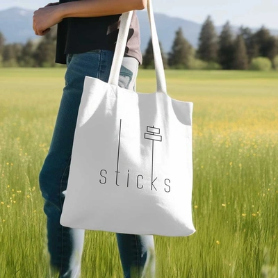 Premium cotton tote with minimalist printed logo - durable and practical for everyday shopping and leisure use